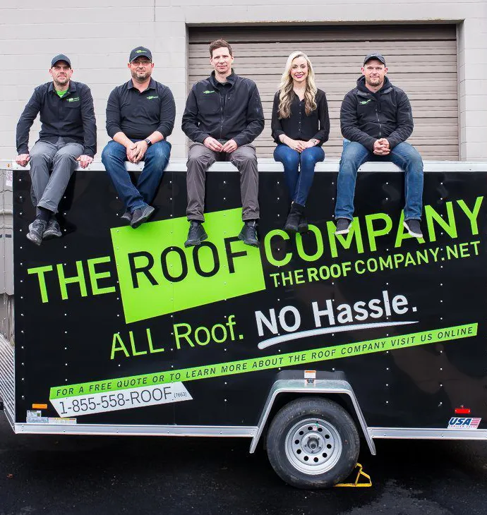 The Roof Company Staffing Sitting on Trailer Smiling 2